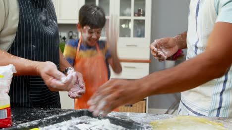 Family-playing-with-flour-in-kitchen-4k
