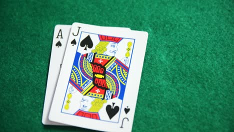 Two-playing-cards-on-poker-table-in-casino-4k