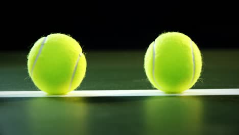 Tennis-balls-arranged-on-white-line-4k