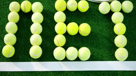Tennis-balls-forming-word-net-in-court-4k