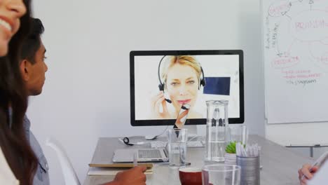 Business-executives-discussing-while-having-video-call-on-computer-4k