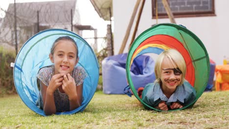 Portrait-of-happy-kids-in-tent-tunnel-4k