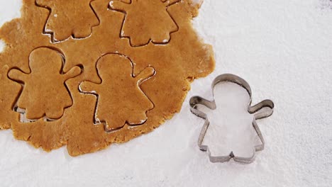 Flattened-dough-cut-with-a-cookie-cutter-4k