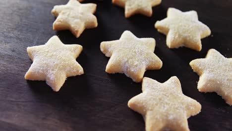 Gingerbread-cookies-with-powdered-sugar-sprinkled-on-top-4k