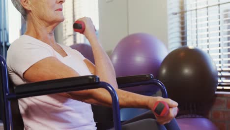 Senior-woman-exercising-with-dumbbells-4k