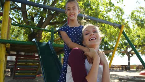 Mother-and-daughter-playing-in-the-playground-4k