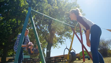 Family-playing-in-the-playground-4k