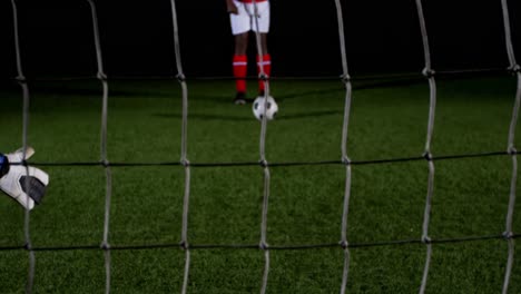Goalkeeper-catching-a-soccer-ball-4k