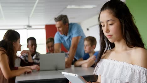 Happy-schoolgirl-using-digital-tablet-4k