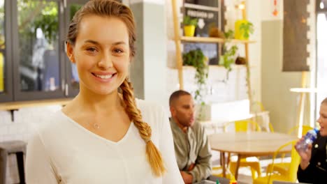Portrait-of-beautiful-waitress-holding-salad-in-plate-4k
