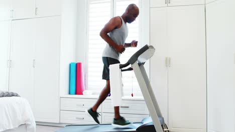 Man-jogging-on-treadmill-4k