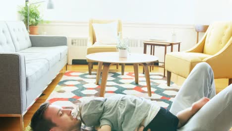 Father-and-baby-boy-having-fun-in-living-room-4k