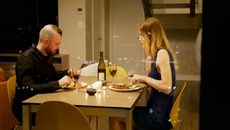 Couple-interacting-with-each-other-while-having-dinner-4k