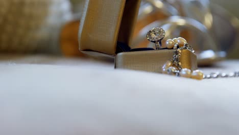 Wedding-diamond-ring,-pearl-necklace-4K-4k