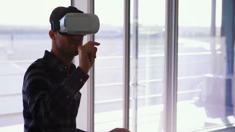 Man-using-virtual-reality-headset-4k