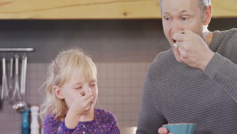 Daughter-and-father-having-breakfast-4k
