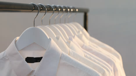 Close-up-of-shirts-hanging-on-hanger-4k