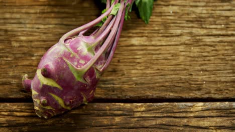 Close-up-of-kohlrabi-on-wooden-table-4k