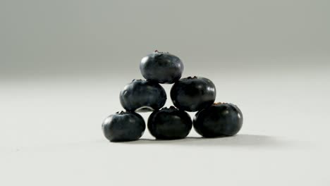 Blueberries-heap-arranged-on-white-background-4K-4k