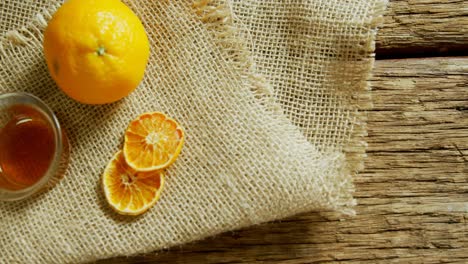 Herbal-tea-with-orange-on-a-textile-4k