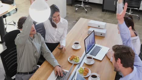 Executives-working-together-at-desk-4k