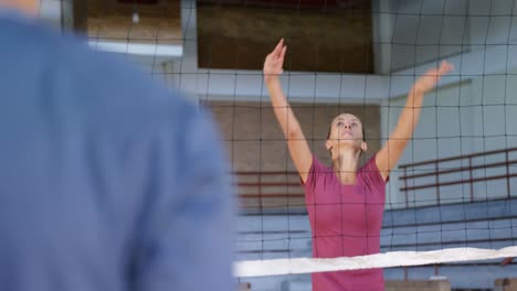Volleyball-players-playing-volleyball-in-the-court-4k