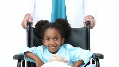 Little-girl-sitting-in-a-wheelchair-