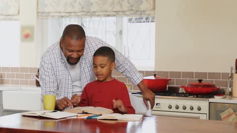 Father-helping-his-son-with-his-homework-4k