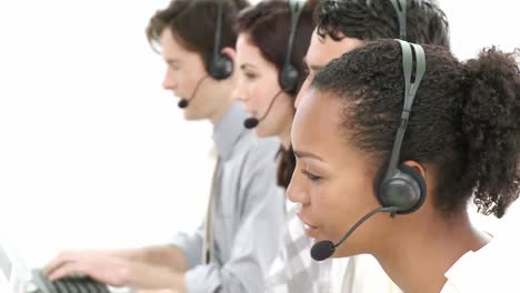 Competitive-businesspeople-working-in-a-call-center