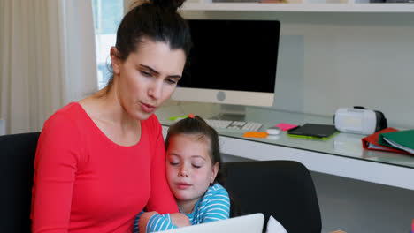 Mother-and-daughter-using-laptop-4k