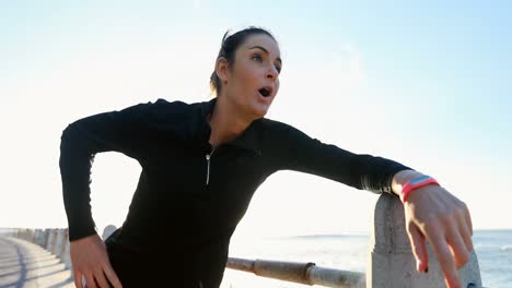 Woman-jogging-near-seaside-4k