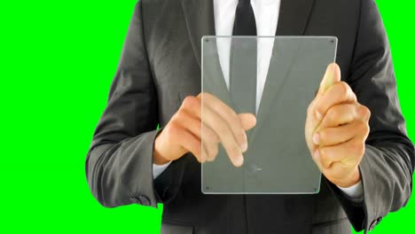 Businessman-using-glass-digital-tablet-4k