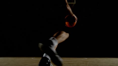 Male-basketball-player-playing-in-the-court-4k
