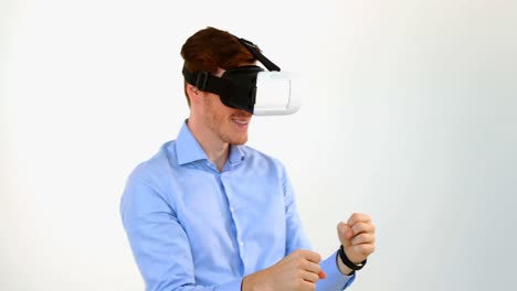 Man-using-virtual-reality-headset-against-white-background-4k