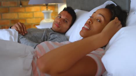 Couple-arguing-on-bed-in-bedroom-4k