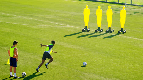 Soccer-player-kicking-the-ball-toward-the-goalpost-4k