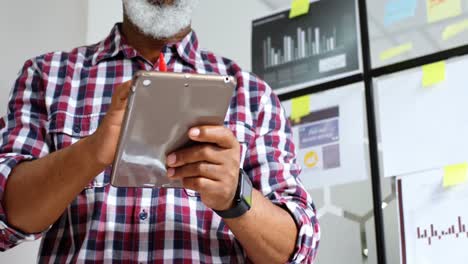 Senior-male-executive-using-digital-tablet-4k