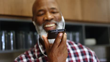 Senior-male-executive-talking-on-mobile-phone-4k