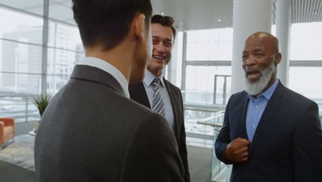 Businessmen-discussing-in-the-office-4k