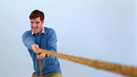Man-pulling-a-rope-tug-of-war-4k