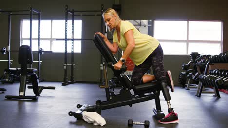 Senior-woman-doing-dumbbell-row-exercise-4k