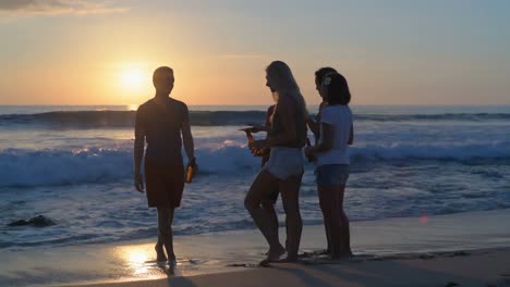 Group-of-friends-taking-selfie-on-the-beach-4k