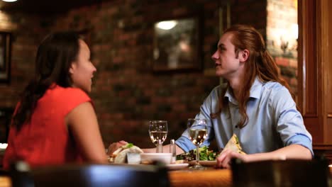 Couple-talking-at-table-4k