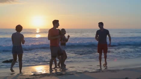 Group-of-friends-dancing-on-the-beach-4k