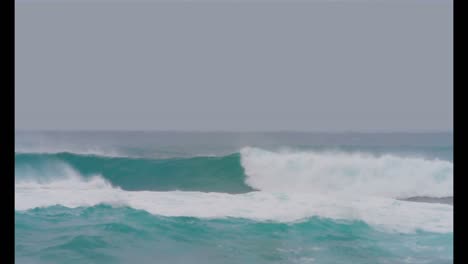 Surfer-surfing-on-sea-waves-4k