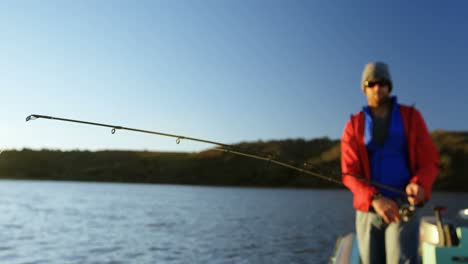 Man-fishing-in-river-4k