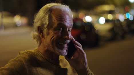 Senior-man-talking-on-mobile-phone-in-the-city-4k