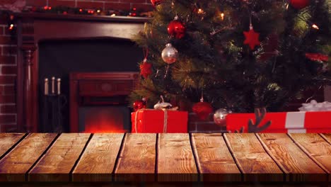 Holzvordergrund-Mit-Weihnachtlichem-Hintergrund-Aus-Baum-Und-Geschenken-Durch-Feuer