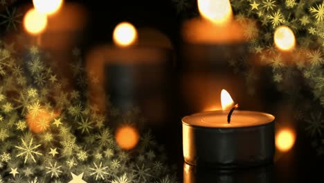 Christmas-candle-burning-with-snowflakes