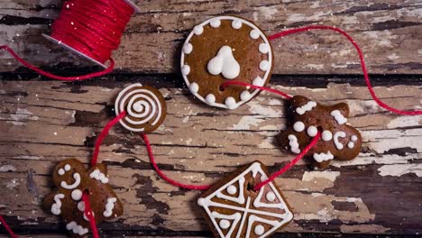 Falling-snow-with-Christmas-decoration-cookies